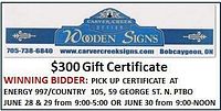 Front of $300 gift certificate showing Carver Creek Wooden Signs logo, contact details, and redemption terms