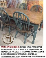 Table and four chairs showing two-tone finish and design