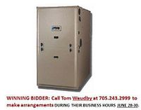 York TM 9E gas furnace in beige compact cabinet