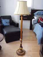 Full view of the floor lamp showing height, base, and stand