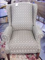 Front view of La-Z-Boy wing back recliner chair with diamond-patterned upholstery and wooden legs, showing fabric condition and build.