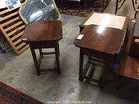 Pair of matching pine side tables shown together, highlighting size and general condition.