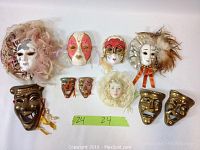 Full view of the 10 masks laid flat on white background to show size and assortment.