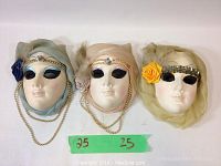 Front view of 3 ceramic female face masks showing detailed veils, flowers, and pearl accents.