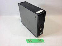 Image showing Dell Optiplex 745 black desktop tower, front and side view.