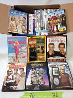 View of a selection of comedy DVDs including Just Go With It, Anchorman 2, Legally Blonde 2, Bad Boys double feature, Little Fockers, The Hangover, Beetlejuice, Health Inspector