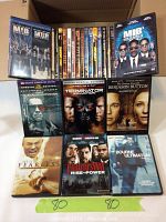Collection of DVDs including Men In Black 1, 2, and 3, Terminator Salvation, Benjamin Button, Fearless, Carlito's Way, and The Bourne Ultimatum