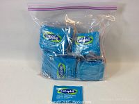 Pack of multiple blue Cetaphil cloth packets inside a clear resealable plastic bag showing at least five packets.