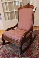 Three-quarter front view showing upholstery and arm