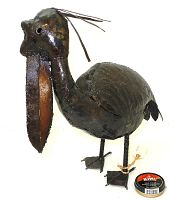 Front and side views of the recycled steel pelican sculpture showing its detailed welding and metal textures.