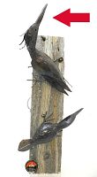 Front angled view showing both large and smaller woodpecker mounted on reclaimed wood