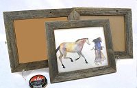 Three barnboard picture/photo frames, one displaying a colorful limited calendar print 'Navajo Woman & Her Horse' by Carole Grigg (USA), and two empty frames with rustic gray wood textures.