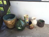 Full view of all items together including pots and wine jug