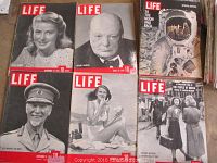 Life magazines with iconic 1930s-1950s covers including Winston Churchill, military personnel, and astronauts.