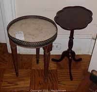 Both side tables together showing their size and design differences.