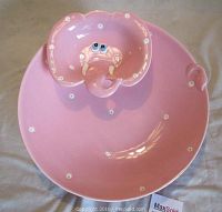 Full view of pink chip and dip bowl with elephant head dip section and polka dots