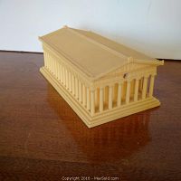 View of the scale model of the Parthenon from an angled side showing detailed roof and columns.