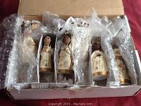 Boxed nativity set, 14 figurines individually wrapped in plastic inside a cardboard box