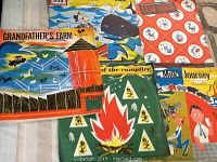 Photo shows all five children's records arranged overlapping, revealing colorful illustrated covers for each record including farm animals, whales, campfire scene, and children.