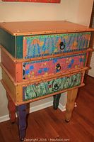 Front view of chest with all three drawers