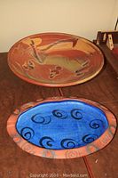 Both ceramic items side by side on a wooden surface showing overall appearance and design.