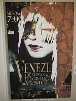 Front view of Venezia show poster print on canvas with visible distressed and torn effect.
