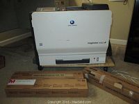 Front view of printer showing model name on white panel