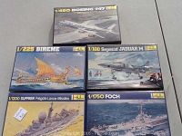 Lot of 5 unopened Heller model kits showing packaging artwork of ships and aircraft models including Boeing 747, Bireme, Jaguar M, Suffren, and Foch.