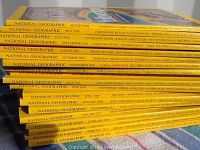Stack of 19 National Geographic magazines showing spine titles from 2002-2012 in good clean condition