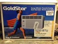 Image showing the front of the Goldstar WG5200R air conditioner box with key features and specifications listed.
