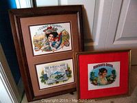 Full view of both framed cigar labels together showing Cuban Cousin and Merchants Queen