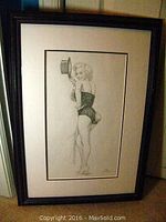 Full view of framed sketch showing mat and frame