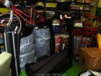 Front view of Bowflex TreadClimber showing dual treadles and handlebars