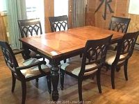 Table and six chairs set viewed from front, leaf installed