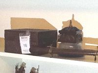 Two Asian style boxes, one metal embossed and one wooden Bombay Company trinket box