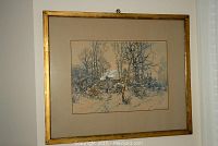 Framed winter landscape painting behind glass with gilt wood frame and neutral mat