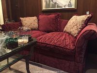 Front view of entire couch with coffee table in front