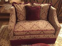 Front view of oversized armchair with three cushions on seat