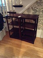 Two shelving units side by side against wall