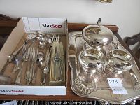 Full view of the silver plated tea service on tray with mixed silver plated cutlery in box.