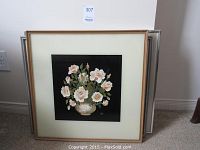 Framed floral oil painting on glass with black background and cream matte, showing full piece