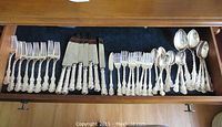 Full drawer view showing all 39 pieces in set