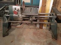 Main frame with table saw blade installed, cast iron tabletop and fence