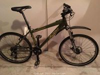 Full side profile showing frame, wheels, fork, saddle and handlebars