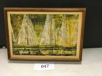 Frontal view of the framed painting showing sailboats in abstract style with yellow and green tones.