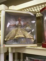 Barbie doll in gold and white 2000 edition gown in original box
