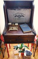 Full view of oak desk with roll-top register open, showing overall styling and condition
