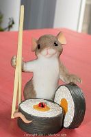 Photo of Fitz & Floyd Charming Tails resin mouse figurine holding chopsticks and leaning on a sushi roll