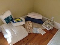 Photo showing the full set of items including duvet, pillows, sheets and curtains.
