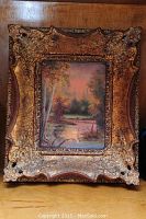 Full view of painting in ornate gilt frame